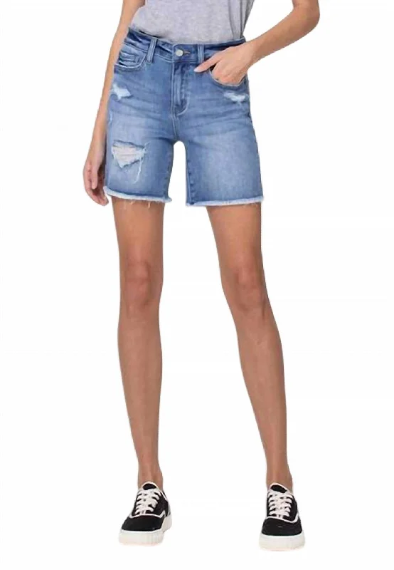 Stretch High Rise Midi Short In Medium Wash